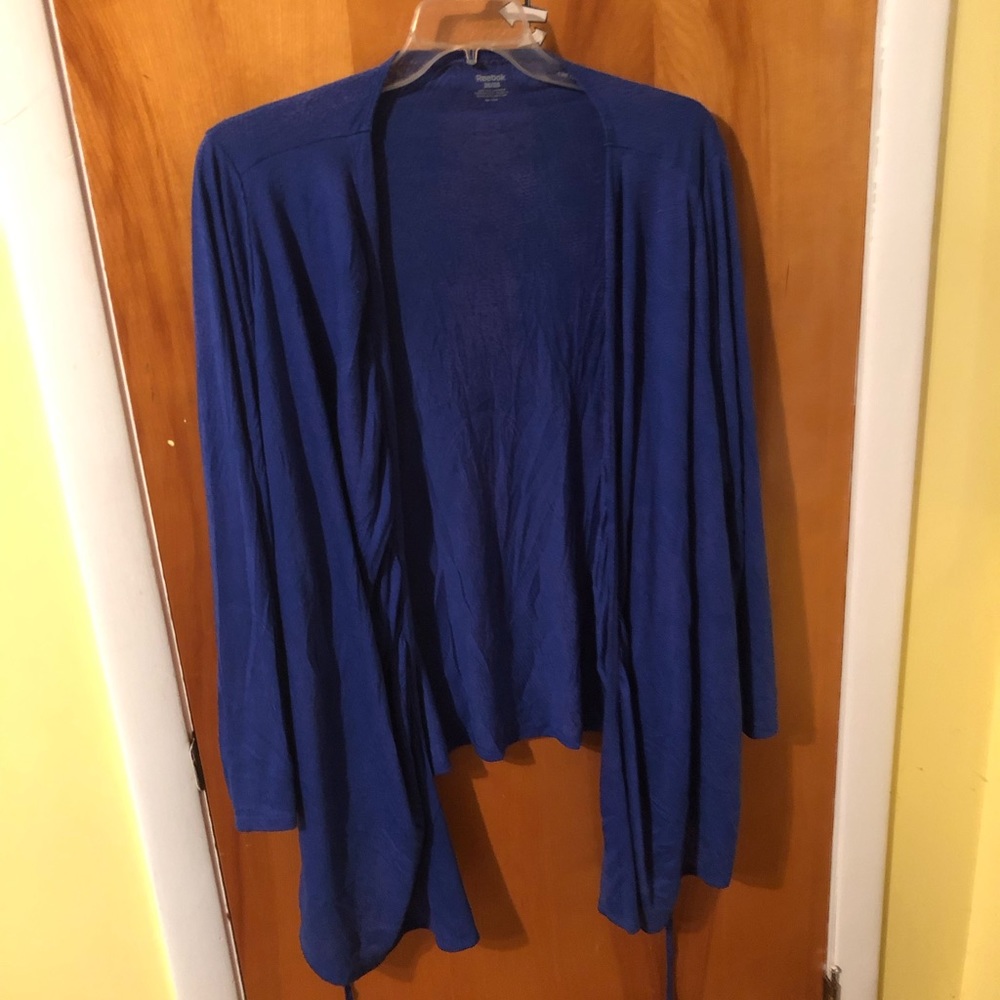 NWT never worn Reebok tie wrap jacket/cover